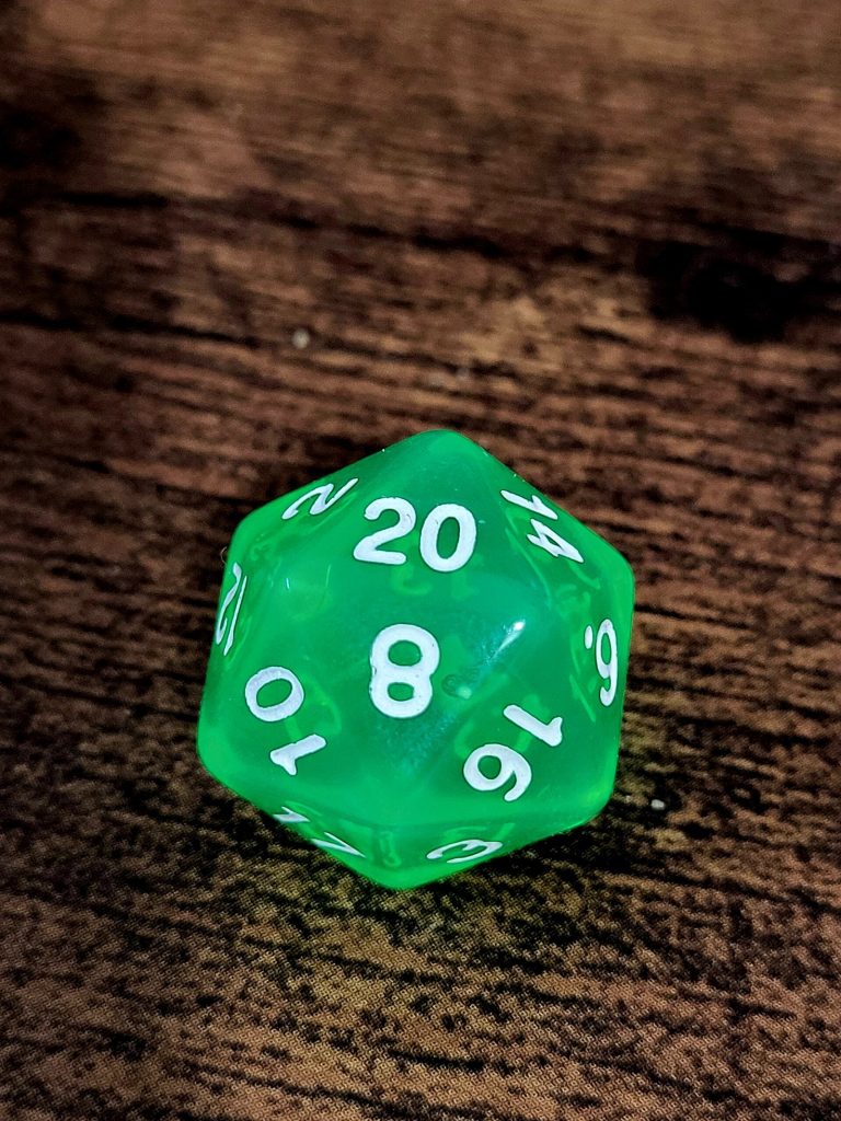 Close-up of a bright green twenty-sided die