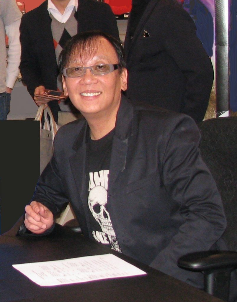 Dragon Quest creator Yuji Horii signing at an event in Palo Alto