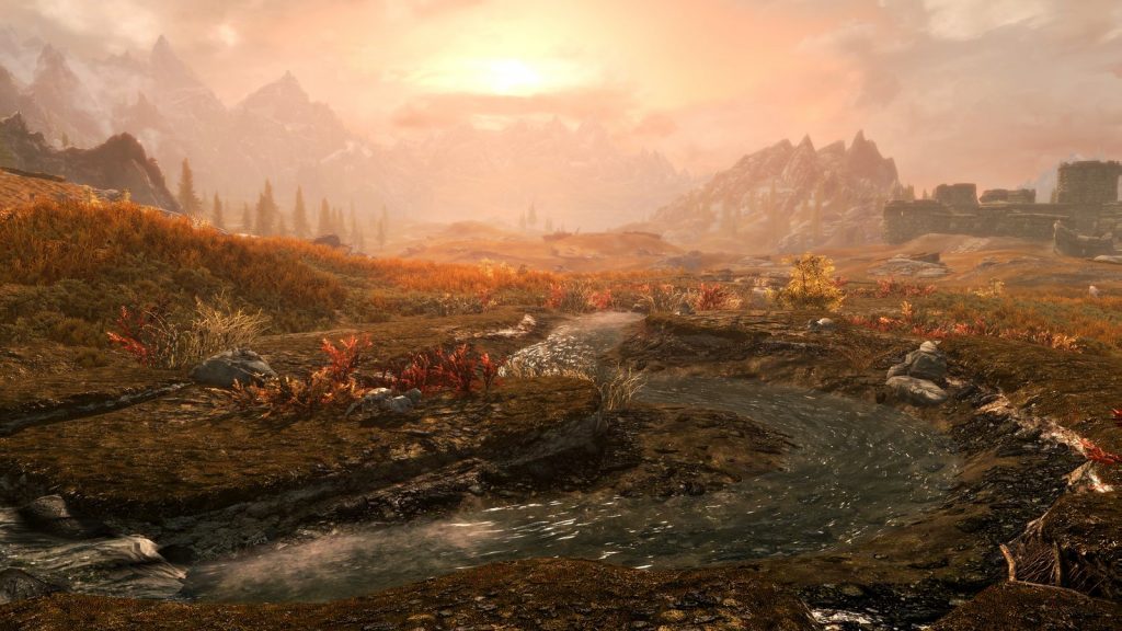 Player character exploring a snowy mountain landscape in Skyrim Special Edition